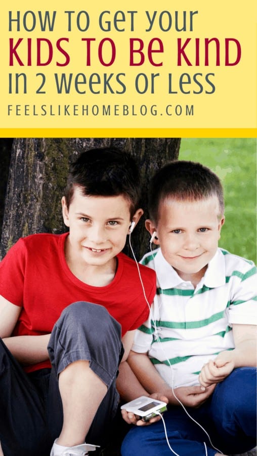 Two boys listening to headphones