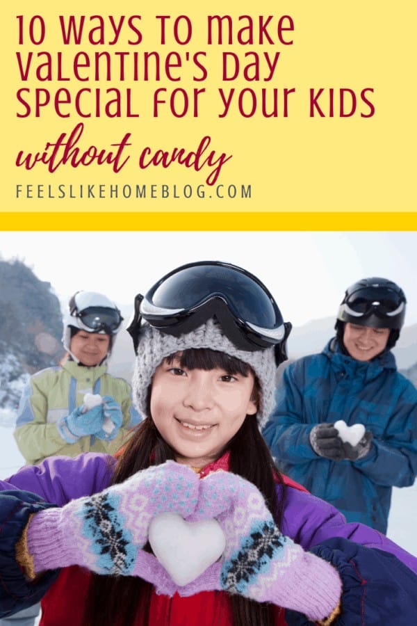 Kids holding hearts made of snow