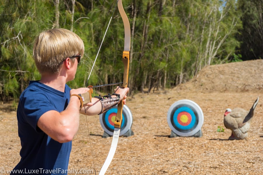 Boy practicing archery on Lanai Hawaii