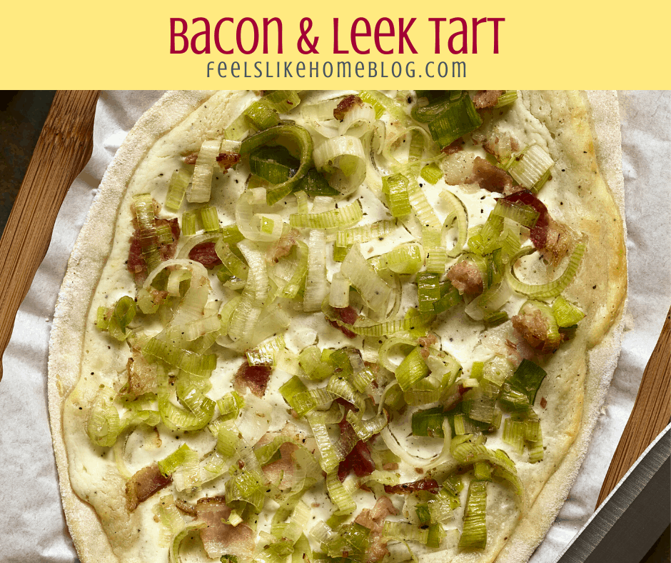 a close up of a bacon and leek tart