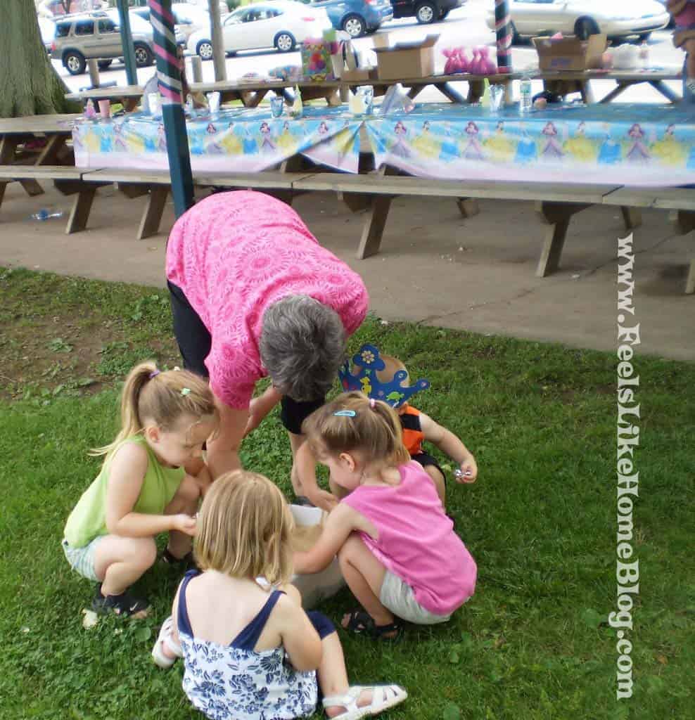 princess birthday party digging in the sand