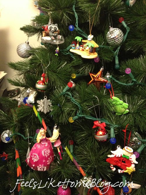 A Christmas tree with multi colored ornaments